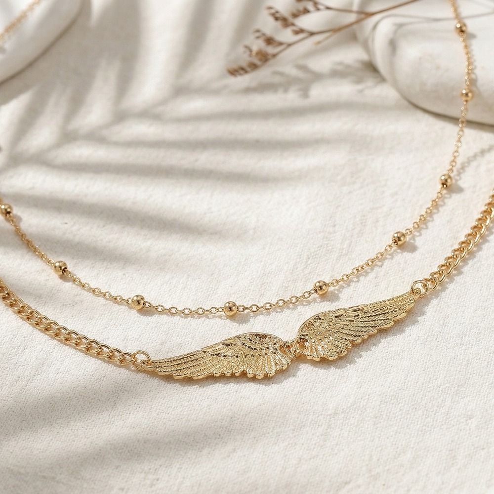 Gift Elegant Double Layer Wing - مراجعة Body Jewelry Gold وسعره