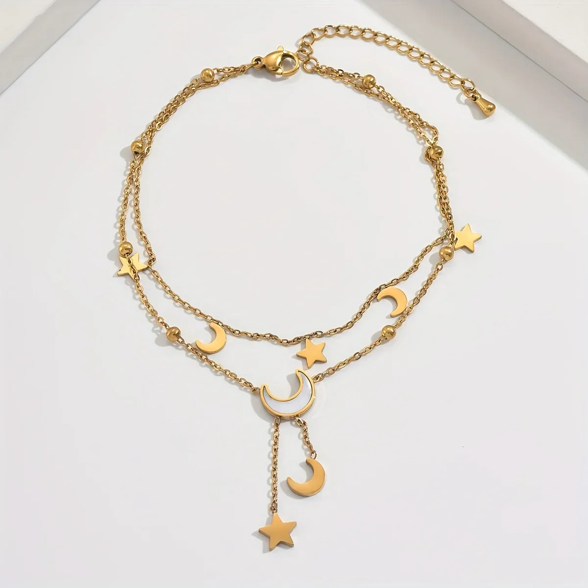 1 golden yellow star and moon  - مراجعة Yellow Body Jewelry وسعره