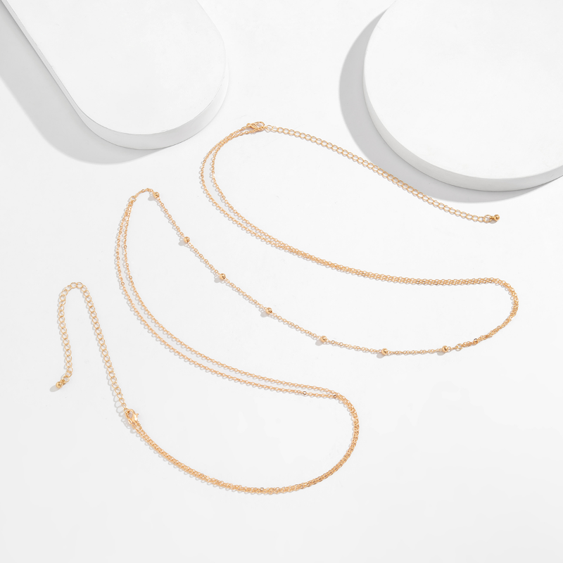 Simple Cross Chest Breast Bell - مراجعة Body Jewellery وسعره